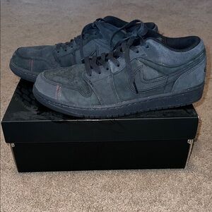 Nike Air Jordan 1 Low Sneakers in Smoke Grey with Red Stitch Accents